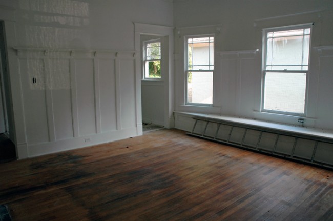 Bay window and door to kitchen.