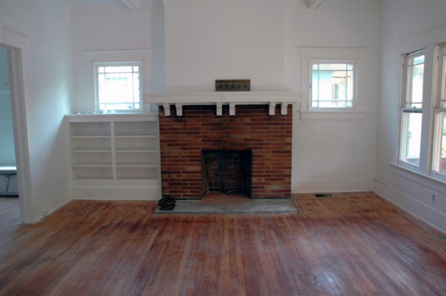 Fire place and built-in bookshelf.