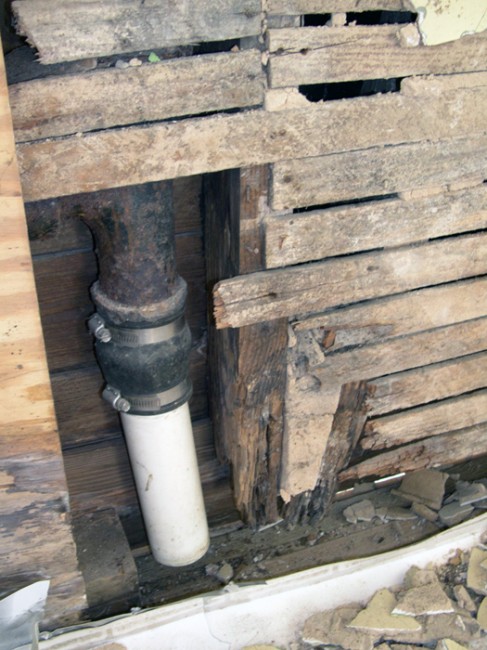 The cut pipes (done pre-purchase) and rotten wood.