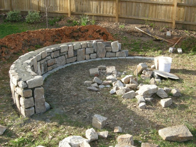 The granite wall starting to come together! Ray was able to find reclaimed granite from a 1910 house that had been demolished near Decatur.